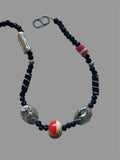 Carved Faces Necklace