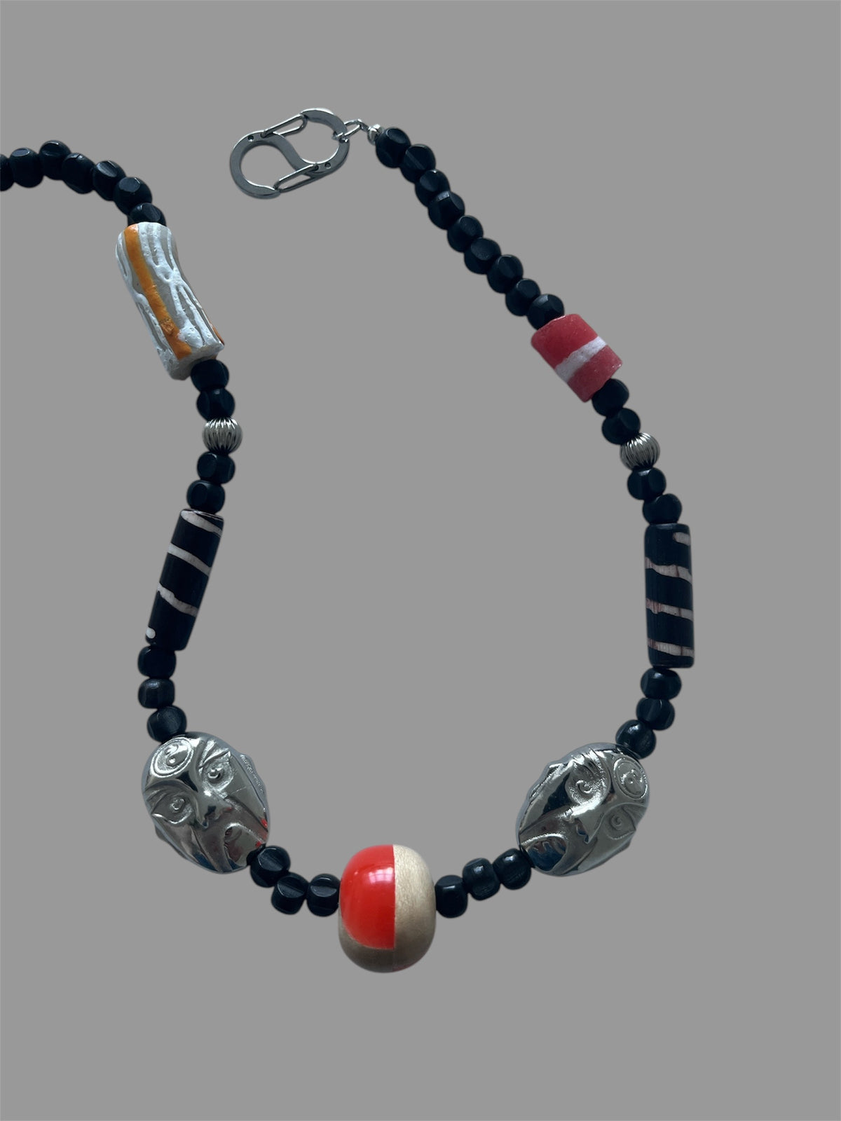 Carved Faces Necklace