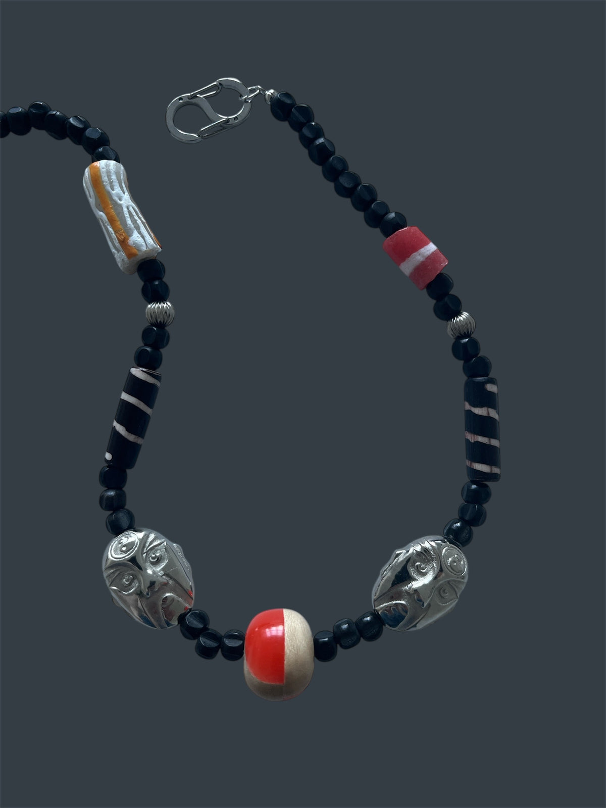 Carved Faces Necklace