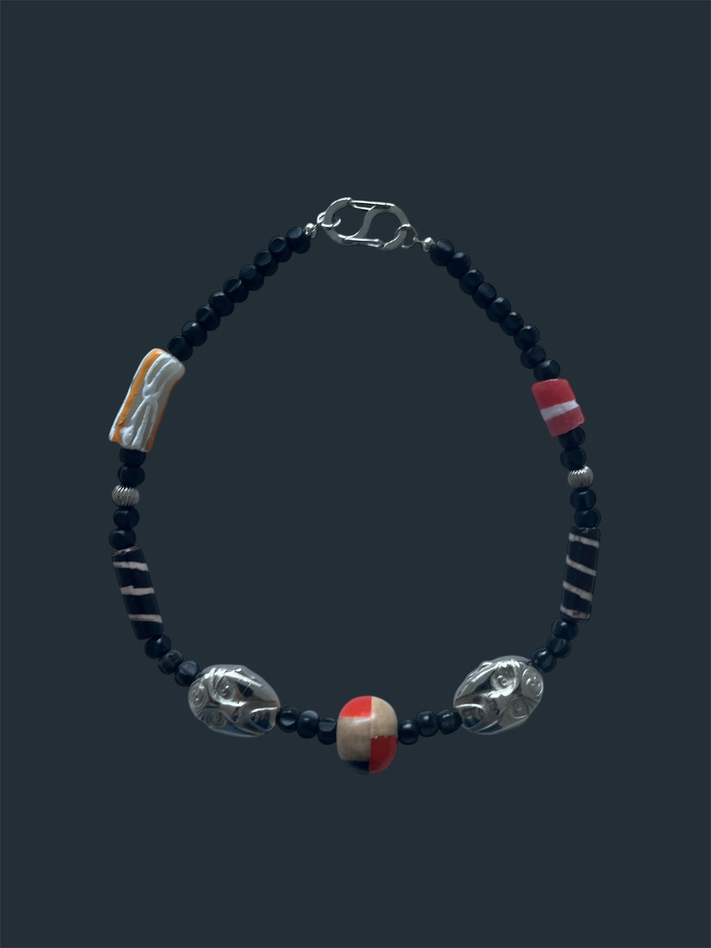 Carved Faces Necklace