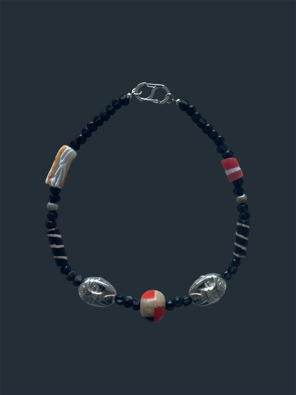Carved Faces Necklace